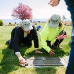 A Salute to Veterans Shining Honor Project event cleaning veterans headstones - Kalispell, Montana